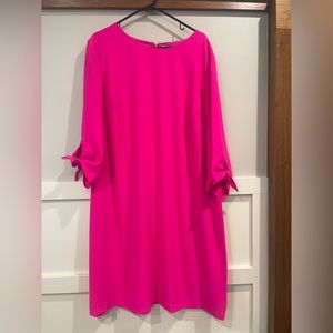 Beautiful pink dress. Perfect for a wedding. Lined, ties below elbow.